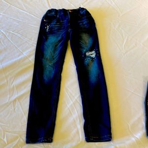 Girls size 10 skinny jeans with Crystal accents. Spandex/cotton stretch